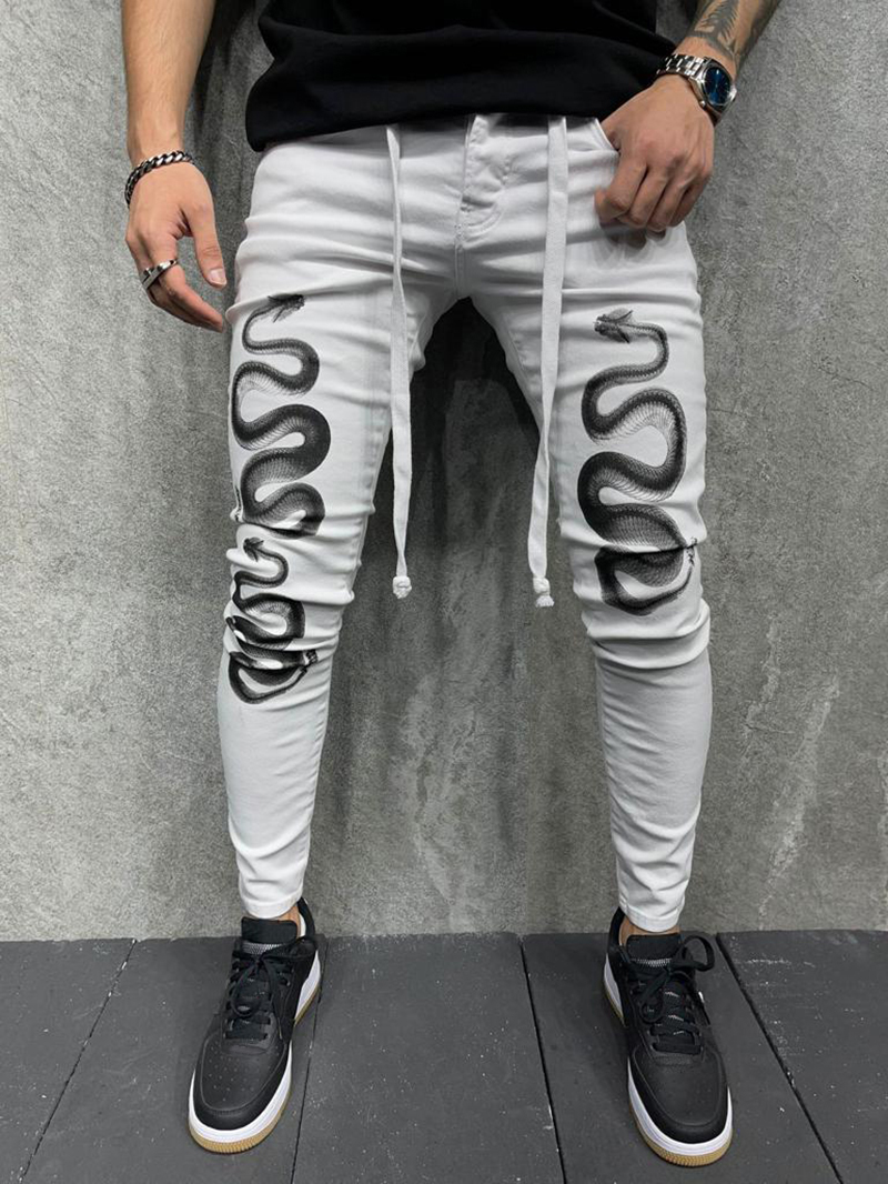 Men's snake patterned skinny jeans