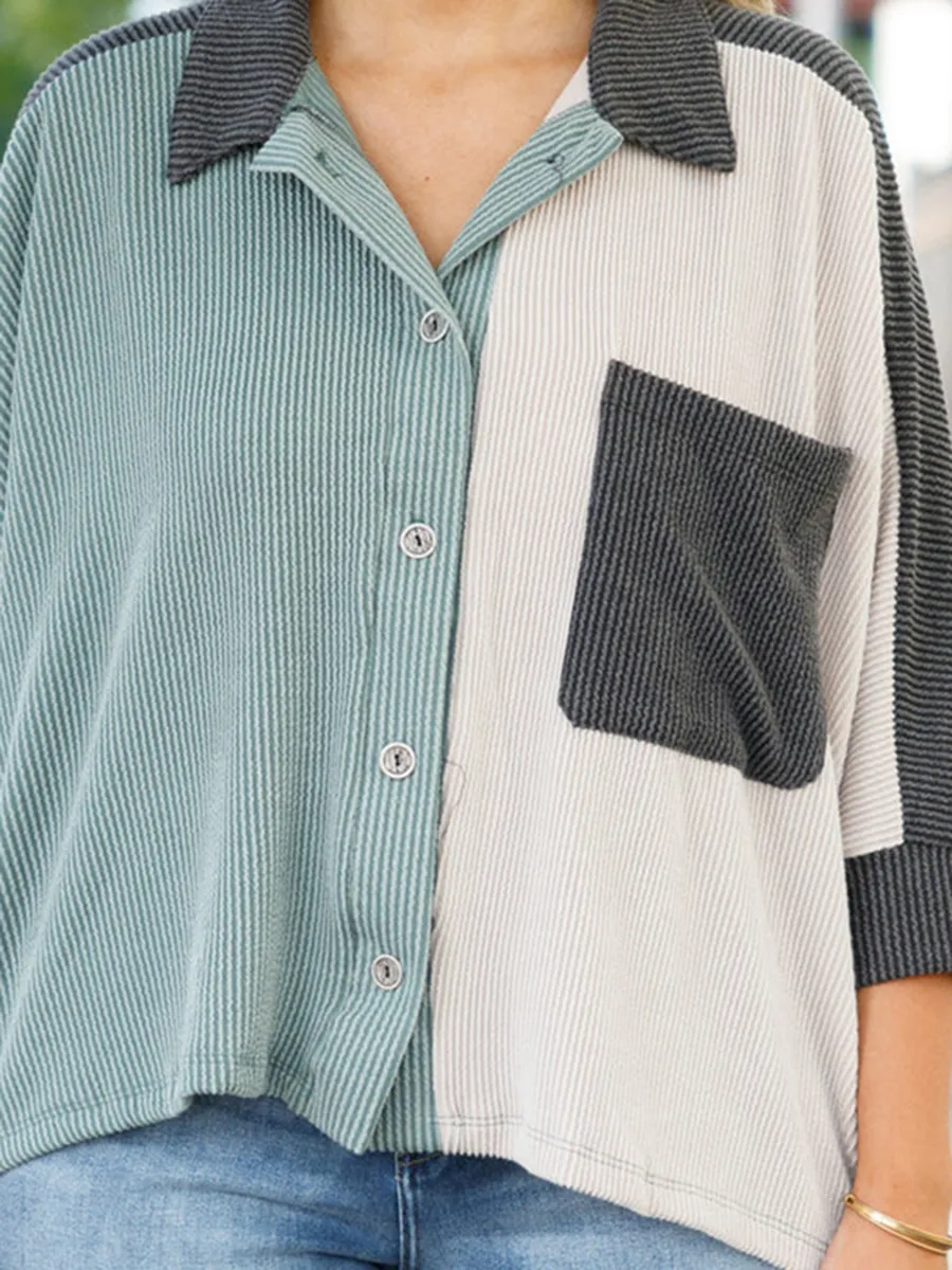 Spliced contrasting button pocket shirt
