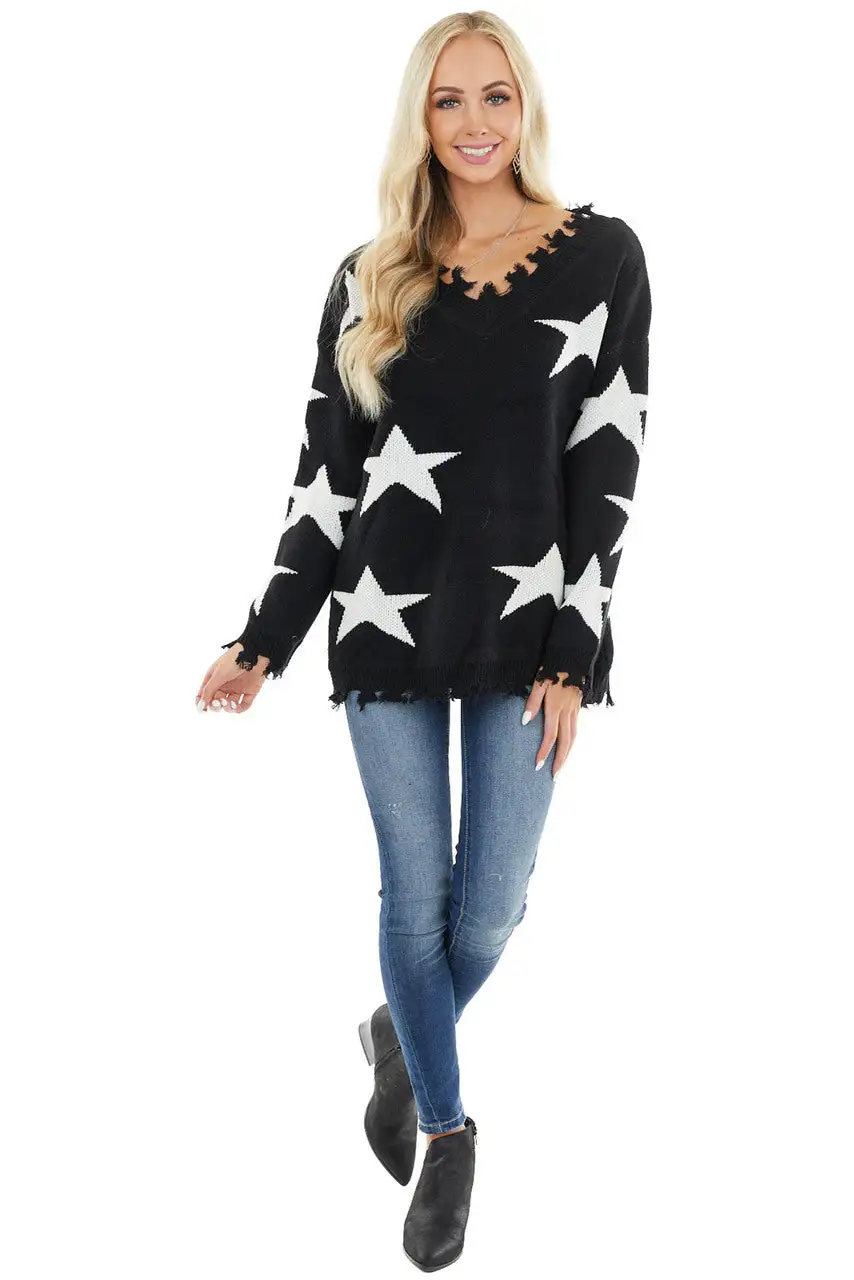 Black and Ivory Star Print Sweater Top with Fringe Detail