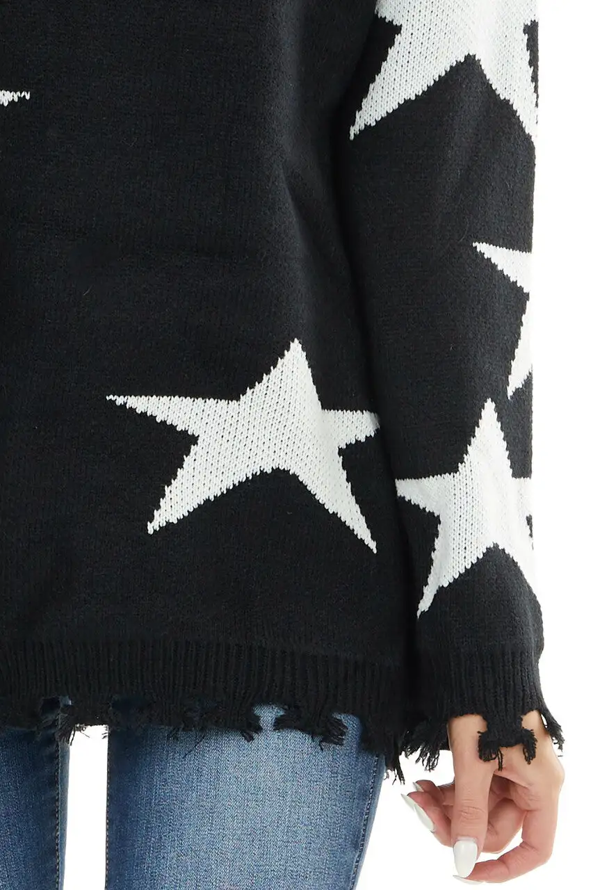 Black and Ivory Star Print Sweater Top with Fringe Detail